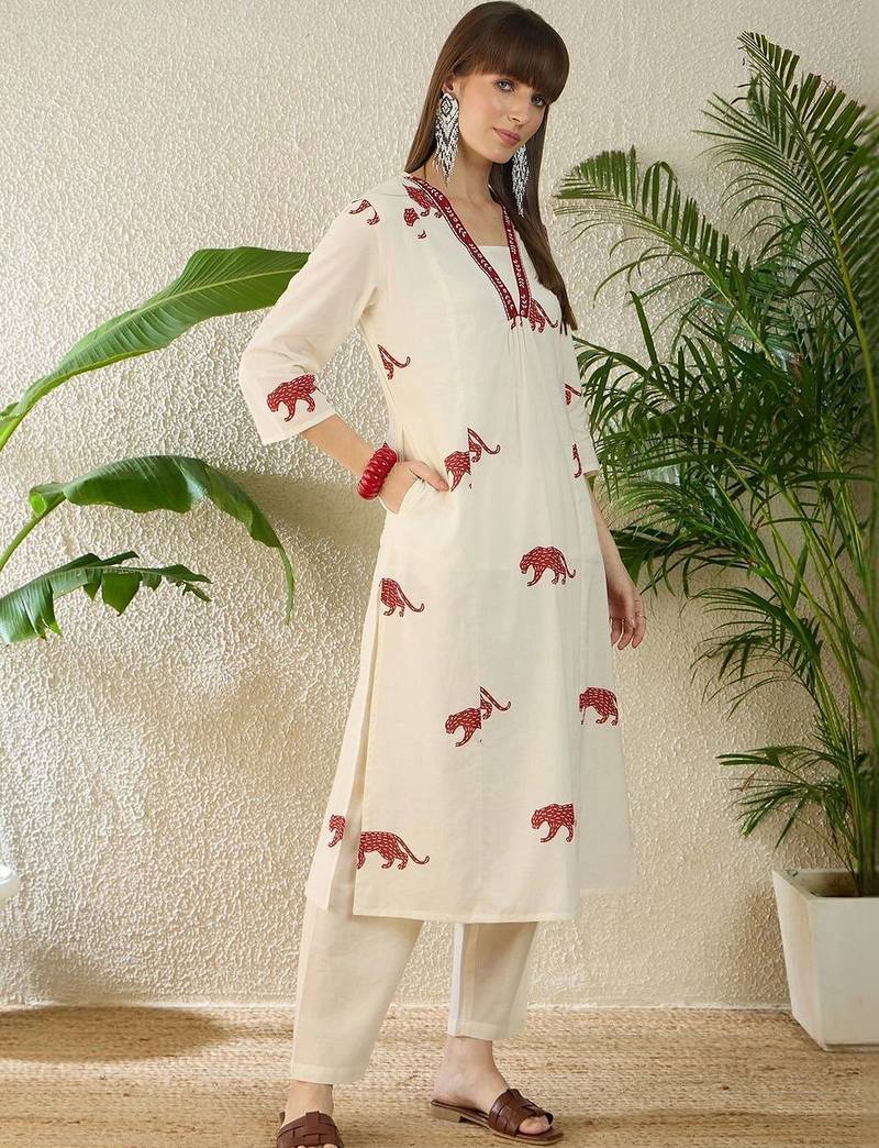 women animal printed regular thread work cotton kurta with trousers