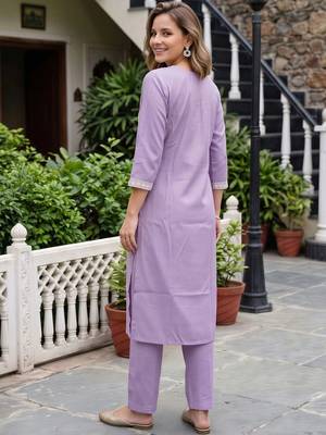 women embroidered regular thread work kurta with trousers 4