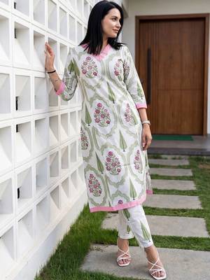 women floral printed regular cotton kurta with trousers 1