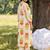 women printed regular cotton kurta with trousers
