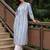 women printed regular cotton kurta with trousers