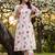 women printed regular cotton kurta with trousers