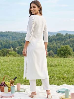 women printed regular cotton kurta with trousers 4