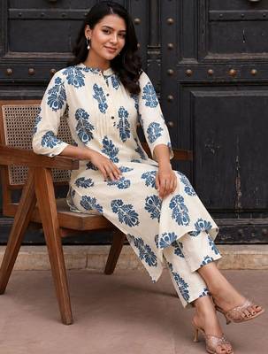 women floral printed regular cotton kurta with trousers 5