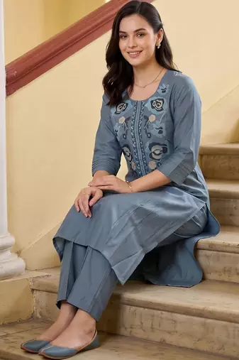 women floral embroidered regular thread work kurta with trousers