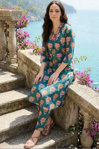 women floral printed regular cotton kurta with trousers