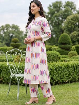 women printed regular cotton kurta with trousers 3