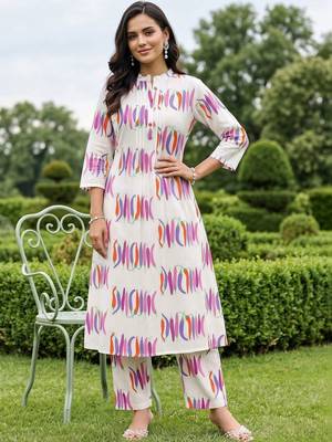 women printed regular cotton kurta with trousers 6