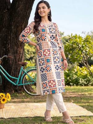 women printed regular kurta with trousers 1