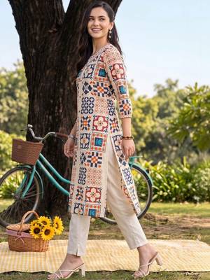 women printed regular kurta with trousers 6