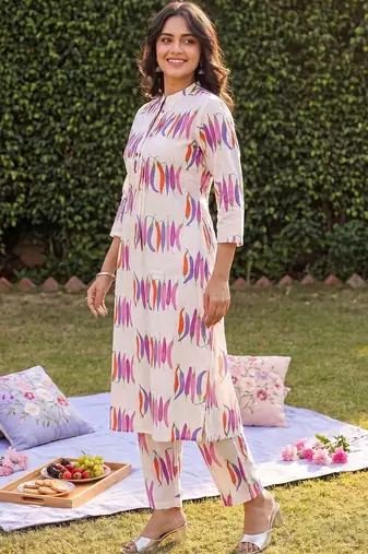 women printed regular cotton kurta with trousers