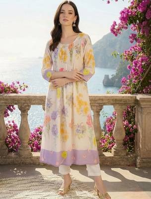 women floral printed regular cotton kurta with trousers 4