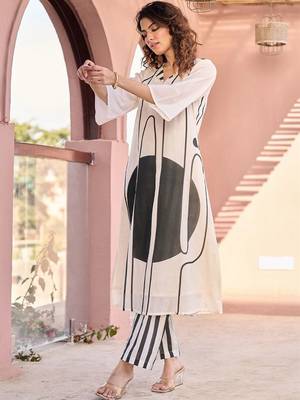 women printed regular cotton kurta with trousers 7