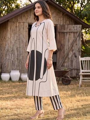 women printed regular cotton kurta with trousers 3