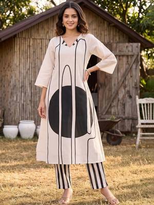 women printed regular cotton kurta with trousers 6