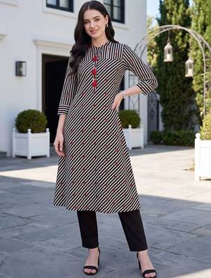 women printed regular cotton kurta with trousers 6