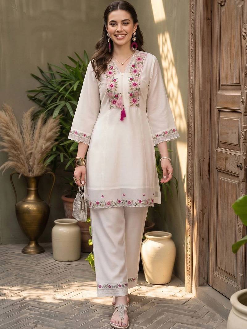 women floral embroidered regular thread work kurta with palazzos