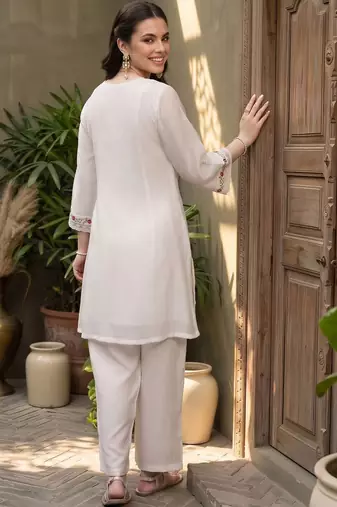 women floral embroidered regular thread work kurta with palazzos