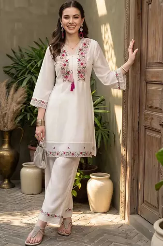women floral embroidered regular thread work kurta with palazzos