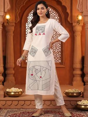 women printed regular cotton kurta with trousers 6