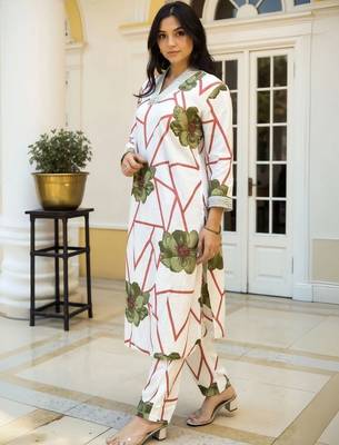 women floral printed regular cotton kurta with trousers 1