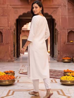 women printed regular cotton kurta with trousers 4