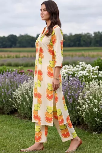 women printed regular cotton kurta with trousers