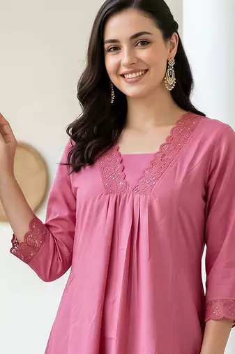 women pleated thread work kurta with trousers