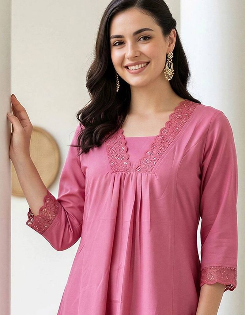 women pleated thread work kurta with trousers