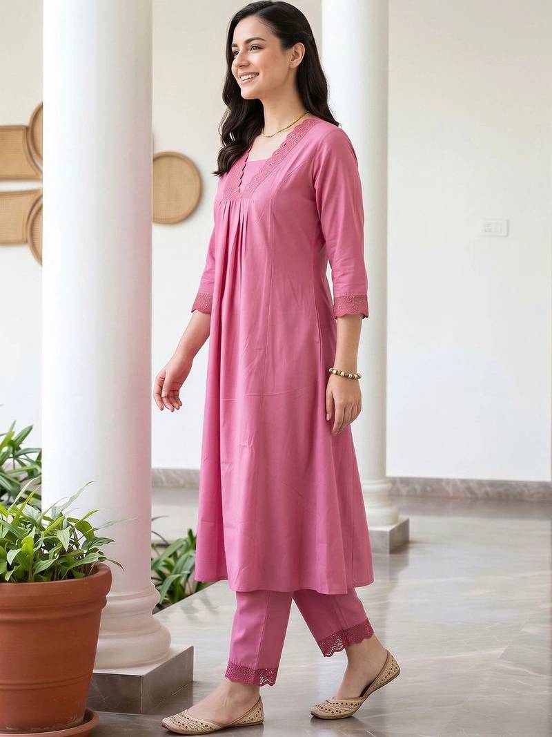 women pleated thread work kurta with trousers