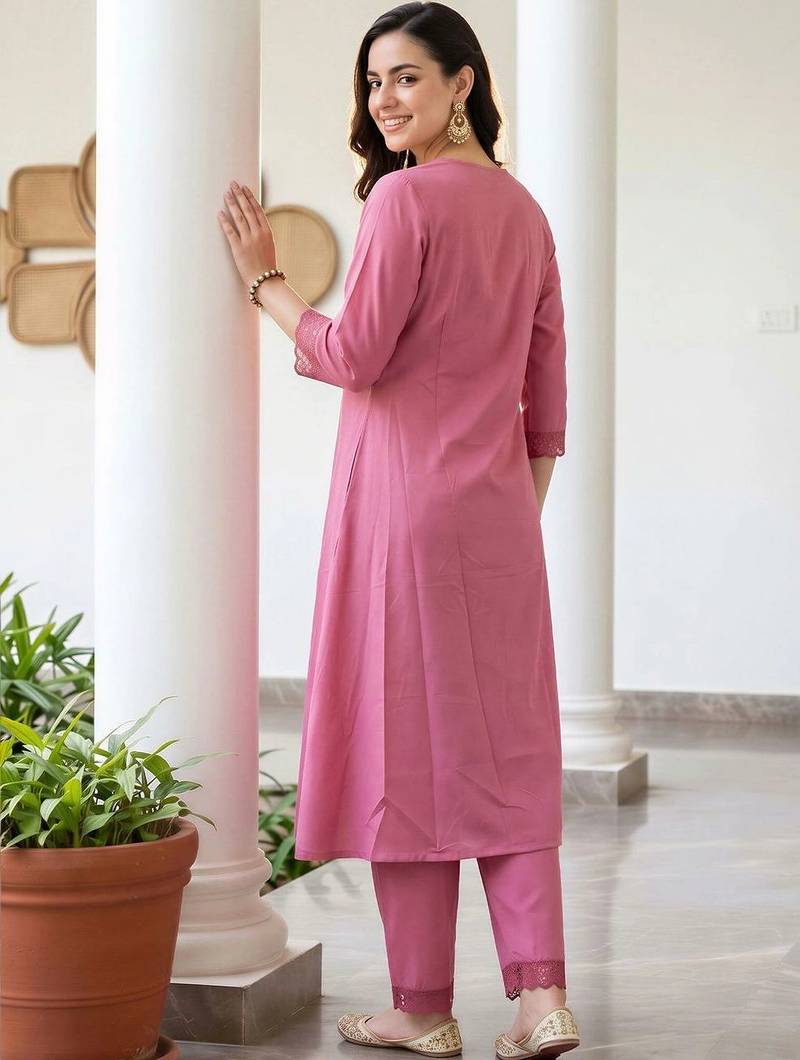 women pleated thread work kurta with trousers