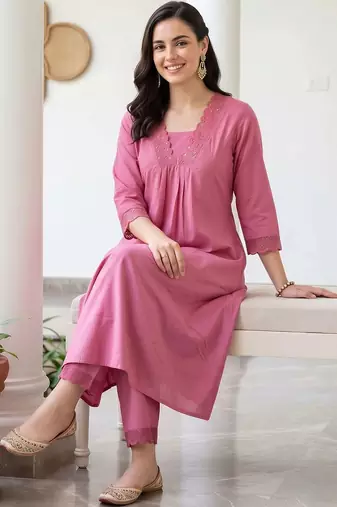 women pleated thread work kurta with trousers