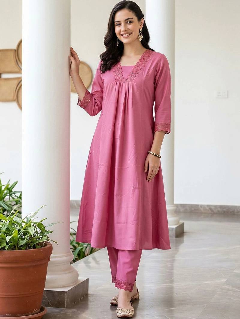 women pleated thread work kurta with trousers