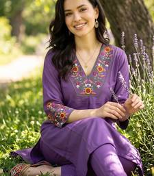 women floral embroidered regular thread work kurta with trousers