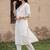 women floral embroidered regular thread work kurta with trousers