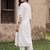 women floral embroidered regular thread work kurta with trousers