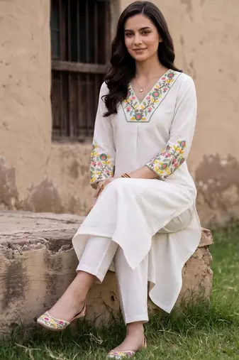 women floral embroidered regular thread work kurta with trousers