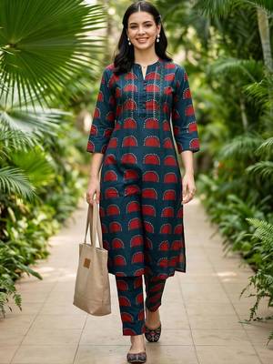 women printed regular cotton kurta with trousers 6