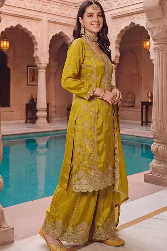 women ethnic motifs embroidered regular kurta with sharara & with dupatta