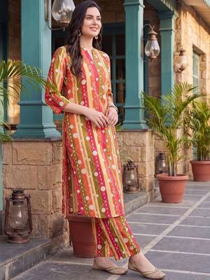 women printed regular cotton kurta with trousers 4