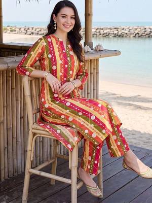 women printed regular cotton kurta with trousers 2