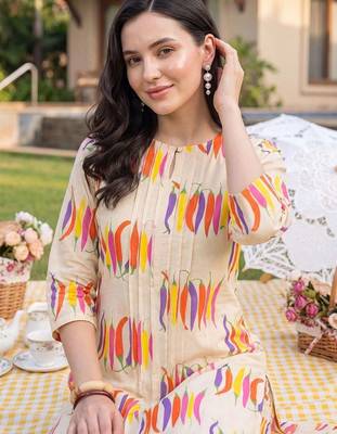 women printed regular cotton kurta with trousers 2