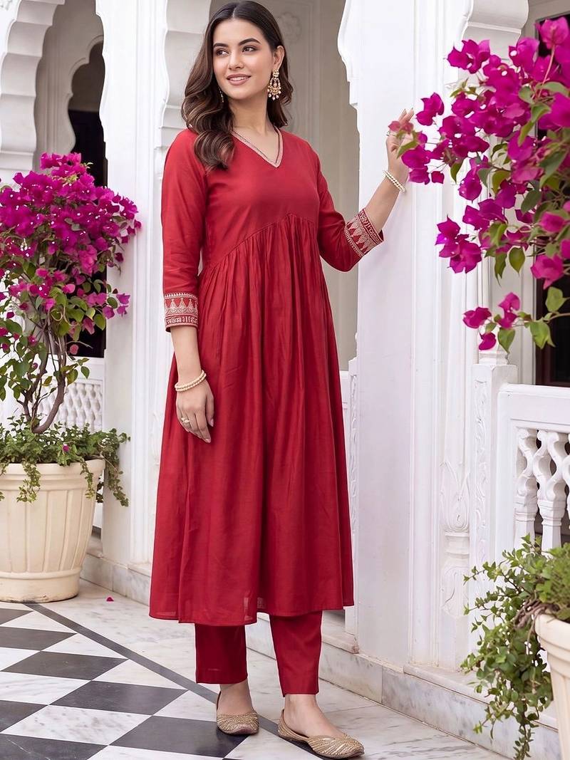 women empire thread work liva kurta with trousers