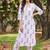 women floral printed regular cotton kurta with trousers