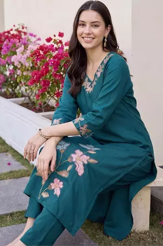 women floral embroidered regular thread work kurta with trousers