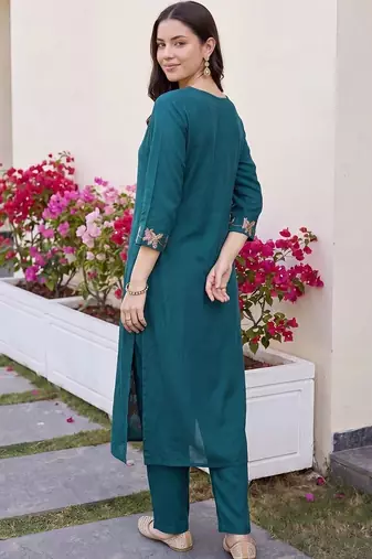 women floral embroidered regular thread work kurta with trousers