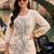 women floral embroidered regular thread work cotton kurta with trousers
