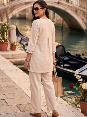 women floral embroidered regular thread work cotton kurta with trousers 5