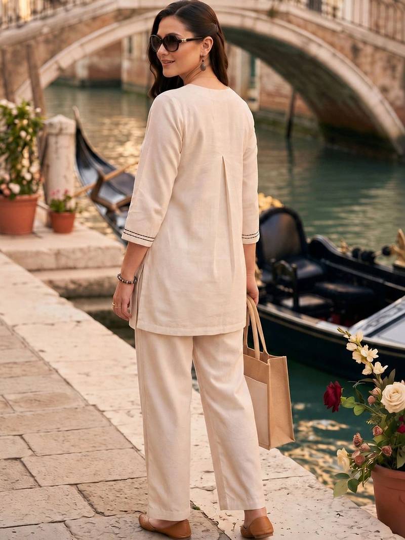 women floral embroidered regular thread work cotton kurta with trousers