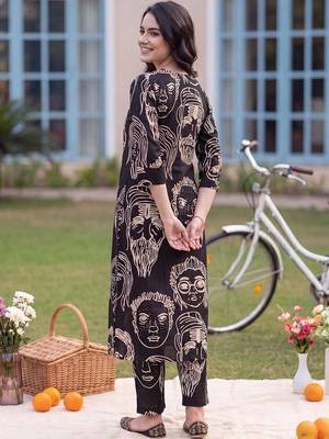 women printed regular cotton kurta with trousers 4